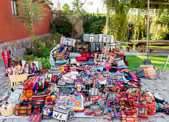 Sacred Valley, Peru - 05/21/2019: Colorful Spanish architecture and market place in Yucay, Peru.