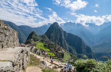 Machu Picchu, Peru - 05/21/2019:  Inca site of Machu Picchu and the surrounding Andes mountains in Peru.