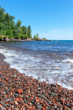 Beautiful Colorful Stones Along The Shore Of Lake Superior - Vertical