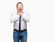 © Krakenimages.com - Middle age bussines arab man wearing glasses over isolated background shouting and suffocate because painful strangle. Health problem. Asphyxiate and suicide concept.