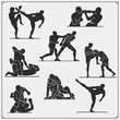 Set of fighting club emblems, labels, badges and icons. Fighters silhouettes.