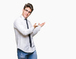 © Krakenimages.com - Young business man wearing glasses over isolated background Inviting to enter smiling natural with open hand