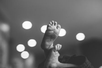 Wall Mural - Newborn Baby Feet Black and White