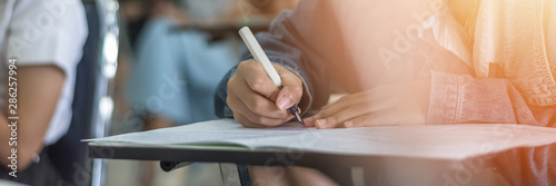 Fotografía Exam at school with student's taking educational admission test in class, thinki