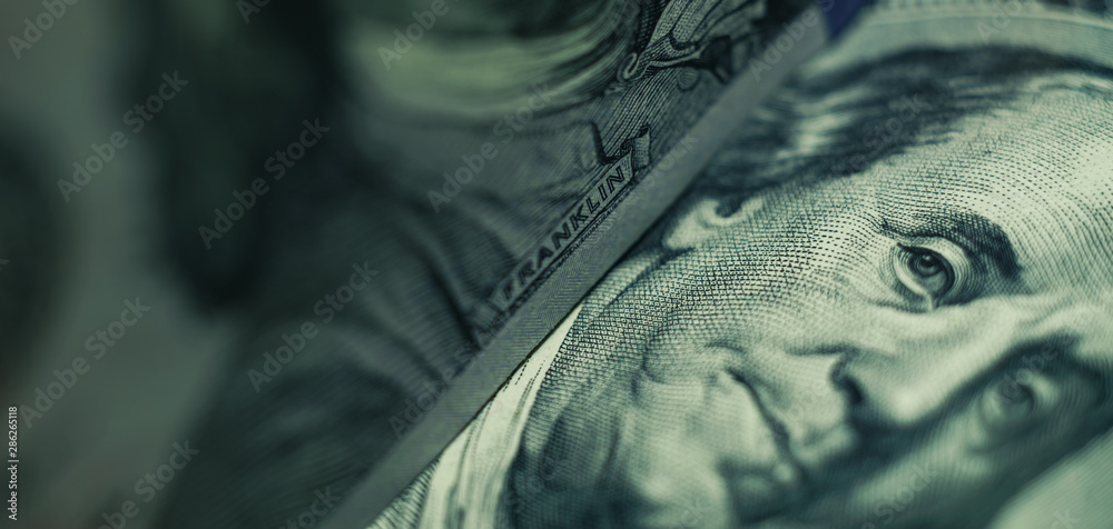 Close up Franklin's face  on a one hundred dollar. American, US Dollars Cash Money background. - obrazy, fototapety, plakaty 