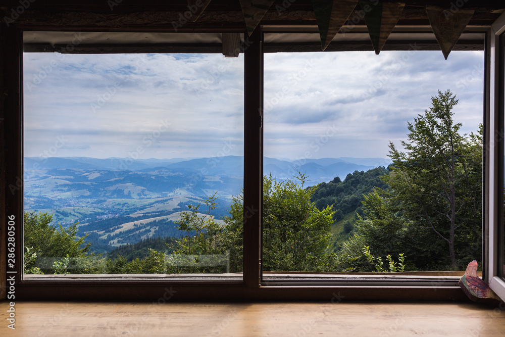 Mountains, view from the window of a wooden house - obrazy, fototapety, plakaty 