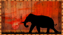 Silhouette Elephants In The Landscape On Blurry Sunset  On A Wooden Sign