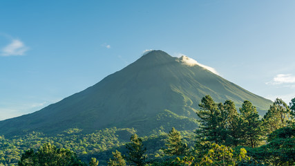 Sticker - Arenal Volcano, which has an almost perfect cone shape, is one of the biggest tourist attraction in Alajuela, Costa Rica