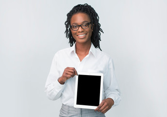 Poster - African American Businesswoman Showing Blank Tablet Screen, White Background