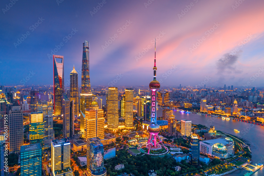 Aerial view of Shanghai skyline at night,China. - obrazy, fototapety, plakaty 