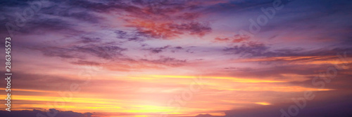 Leinwand Poster  Colourful sky and clouds sunset background