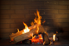 Close Up Shot Of Burning Firewood In The Fireplace.