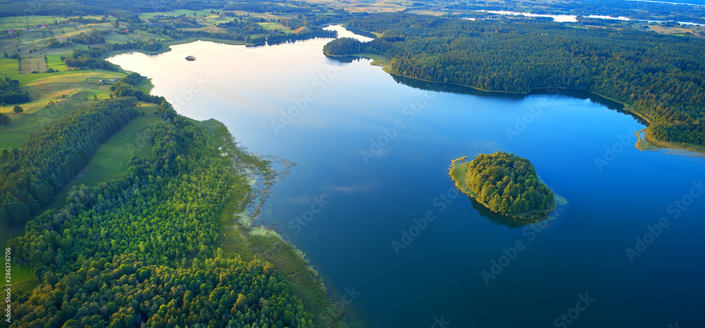 Aerial landscape from the drone - lake in masuria lake district - obrazy, fototapety, plakaty 