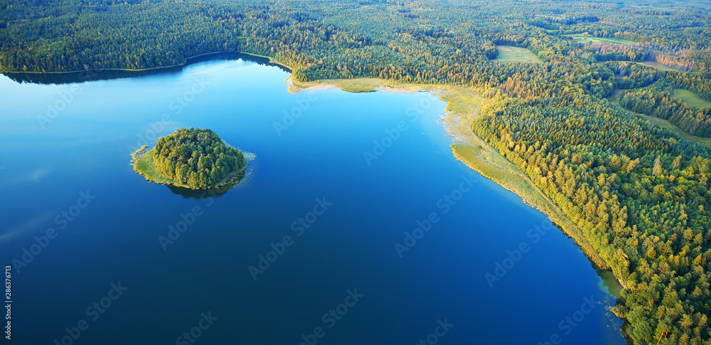 Aerial landscape from the drone - lake in masuria lake district - obrazy, fototapety, plakaty 
