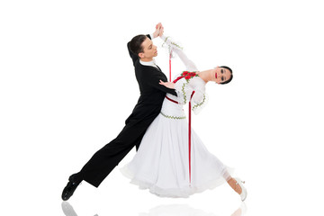 ballroom dance couple in a dance pose isolated on white background. ballroom sensual proffessional dancers dancing walz, tango, slowfox and quickstep just dance