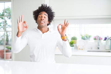 Sticker - African American man relax and smiling with eyes closed doing meditation gesture with fingers. Yoga concept.