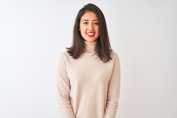 Beautiful chinese woman wearing turtleneck sweater standing over isolated white background with hands together and crossed fingers smiling relaxed and cheerful. Success and optimistic