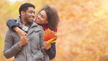 Loving Couple Hugging In Autumn Park, Copy Space