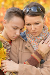 Canvas Print - Close up portrait of mother and son in park