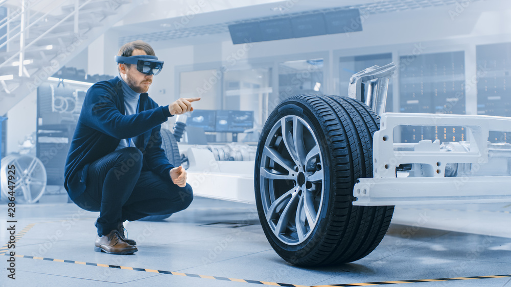 Autogenic Engineer Automotive Engineer Working on Electric Car Chassis Platform, Using ...