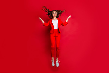 Canvas Print - Full size photo of charming lady with bright lips stick jumping holding hands isolated red background