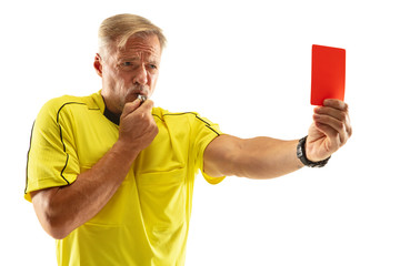 Referee showing a red card and gesturing to a football or soccer player while gaming isolated on white studio background. Concept of sport, rules violation, controversial issues, obstacles overcoming.