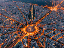 Aerial Of The Arc De Triomphe In Paris, France At Night