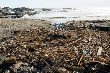 Environmental pollution. Heap of rubbish and waste on the beach in Bali, Indonesia