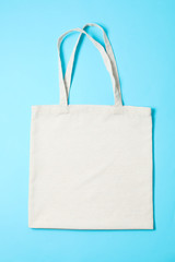 Wall Mural - Eco bag on color background, space for text