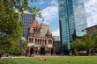 Copley Square in Boston with Trinity Church and Hancock Tower in Background