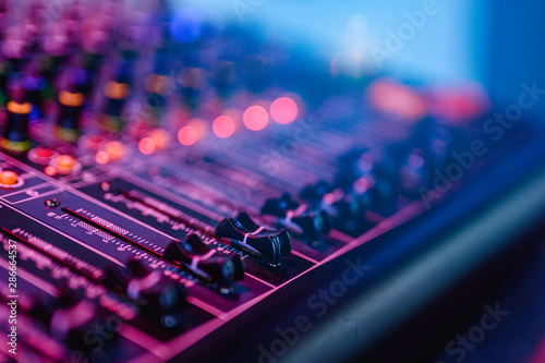 Fotomural Professional audio mixing console in concert.
