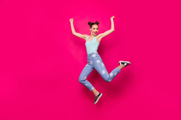 Wall Mural - Full size photo of pretty lady raising hands fists wearing blue singlet isolated over fuchsia background