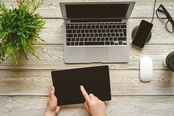 Poster - Flat lay office desk  Workspace with female hand, laptop top view