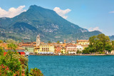 Fototapeta  - RIVA DEL GARDA, ITALY - July 17th, 2019: View to the central part of the town of Riva del Garda on Lake Garda in Nothern Italy