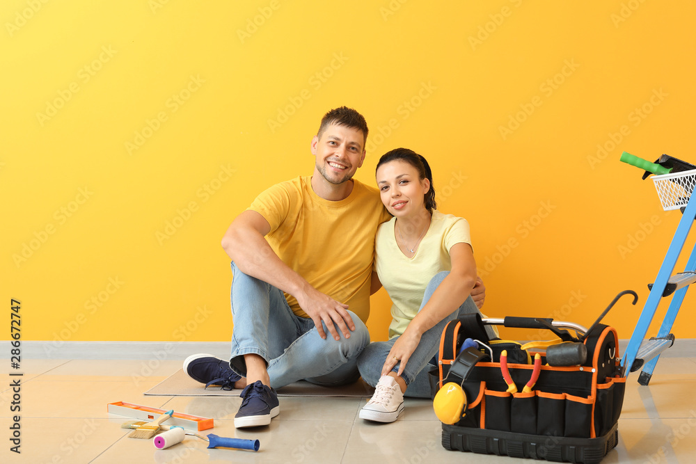 Happy couple during repair in their new house