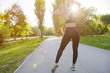 © fotofabrika - Sporty young woman in sportswear running in the park in the morning