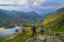 Happy tourists in Romanian mountains
