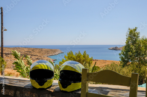 Cuadros en Lienzo motorcycle helmets on a seascape