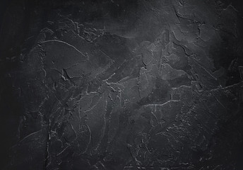 Aufkleber - Abstract decorative textured dark black background with beautiful gray spots, strokes and stains. Texture of wall with decorative plaster on plywood, copy space.