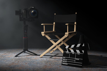 Leinwandbilder - Cinema Industry Concept. DSLR or Video Camera Gimbal Stabilization Tripod System near Director Chair, Movie Clapper and Megaphone in the volumetric light. 3d Rendering