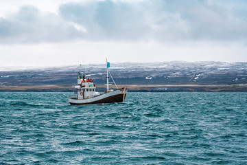 fishin boat in open ocean