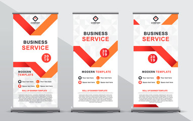 Wall Mural - Set of three orange roll up banner template. Modern abstract geometric polygonal design composition with portrait presentation.