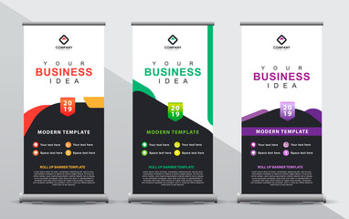 Wall Mural - Set of three roll up banner template. Modern abstract color wave design composition with portrait presentation. Orange, green and blue color.