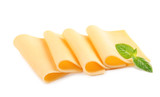 Fototapeta  - Slices of tasty cheese with basil on white background