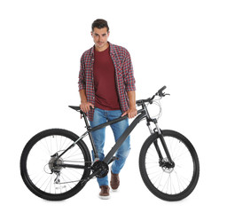 Poster - Handsome young man with modern bicycle on white background