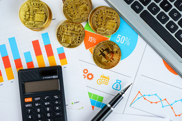 Financial growth concept. Histogram with Bitcoin, keyboard and printed graph. Photo new virtual money