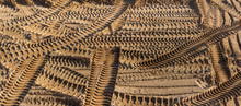 Tire Tracks On The Sand At A Quarry, Industrial Background