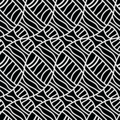  organic wavy black and white lines in seamless pattern design. ethnic tribal design for textiles, fabric, wallpaper, backgrounds, backdrops and surface design templates. the tile is seamless. 
