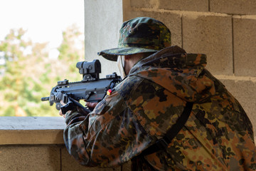 German soldier with a gun at military training area