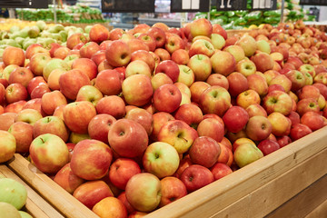 Wall Mural - lots of red, fresh apples for sale at the supermarket